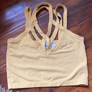 Mustard color tank top from the buckle